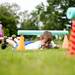 Sam Cleland, 10, crawls under hurdles during the Pittsfield Pee Wee Olympics on Sunday, June 9. Daniel Brenner I AnnArbor.com